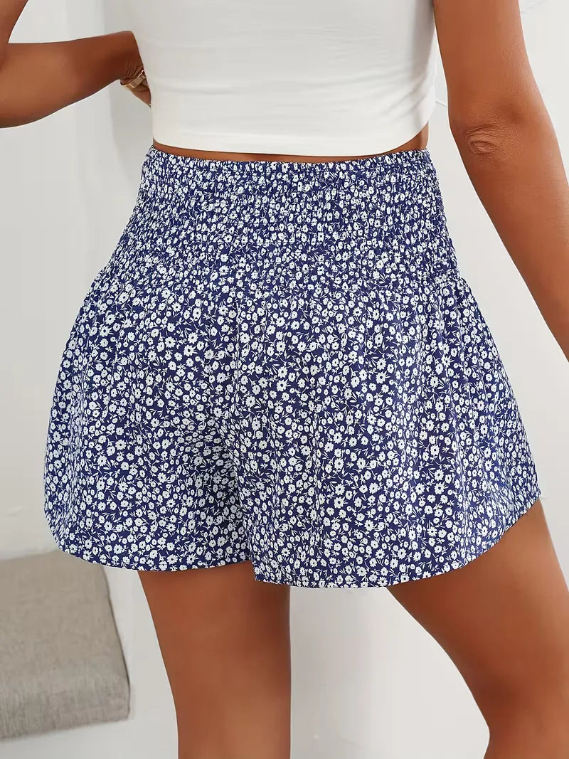 Stijlvolle dames short met bloemprint, hoge taille en wijde pijpen voor een relaxte look.
