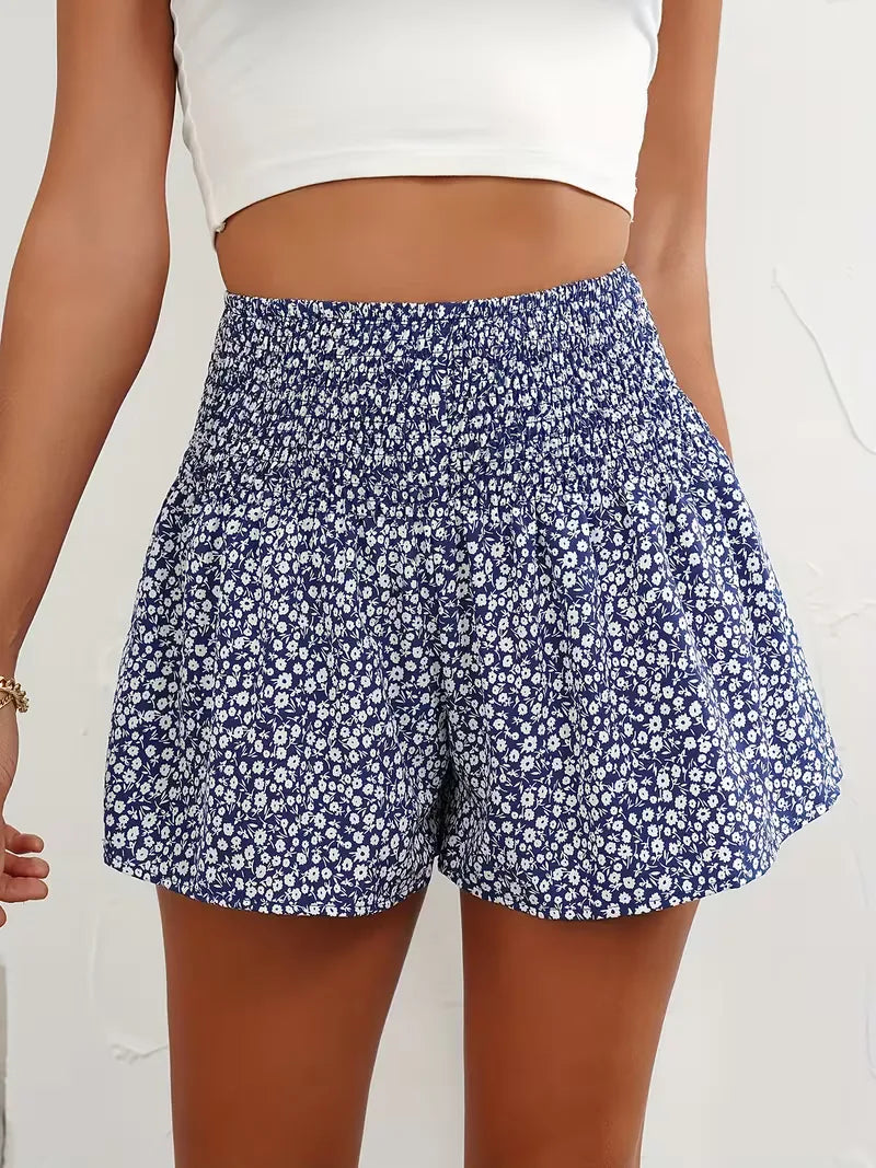 Dames korte broek met bloemenprint, hoge taille. Modieus en comfortabel voor de zomer.