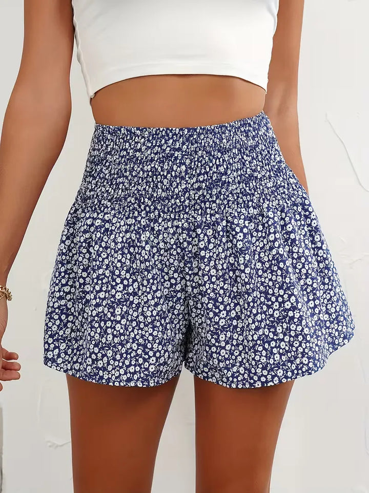 Dames korte broek met bloemenprint, hoge taille. Modieus en comfortabel voor de zomer.