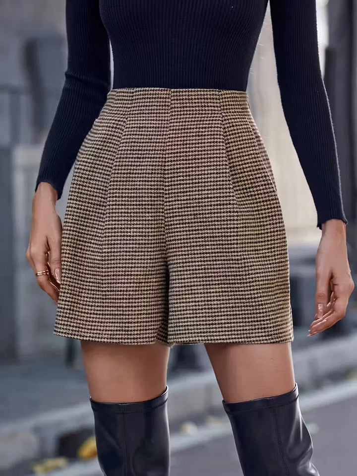 Zwart-wit geruite dames shorts met hoge taille en wijde pijpen, elegant en veelzijdig voor elke gelegenheid.