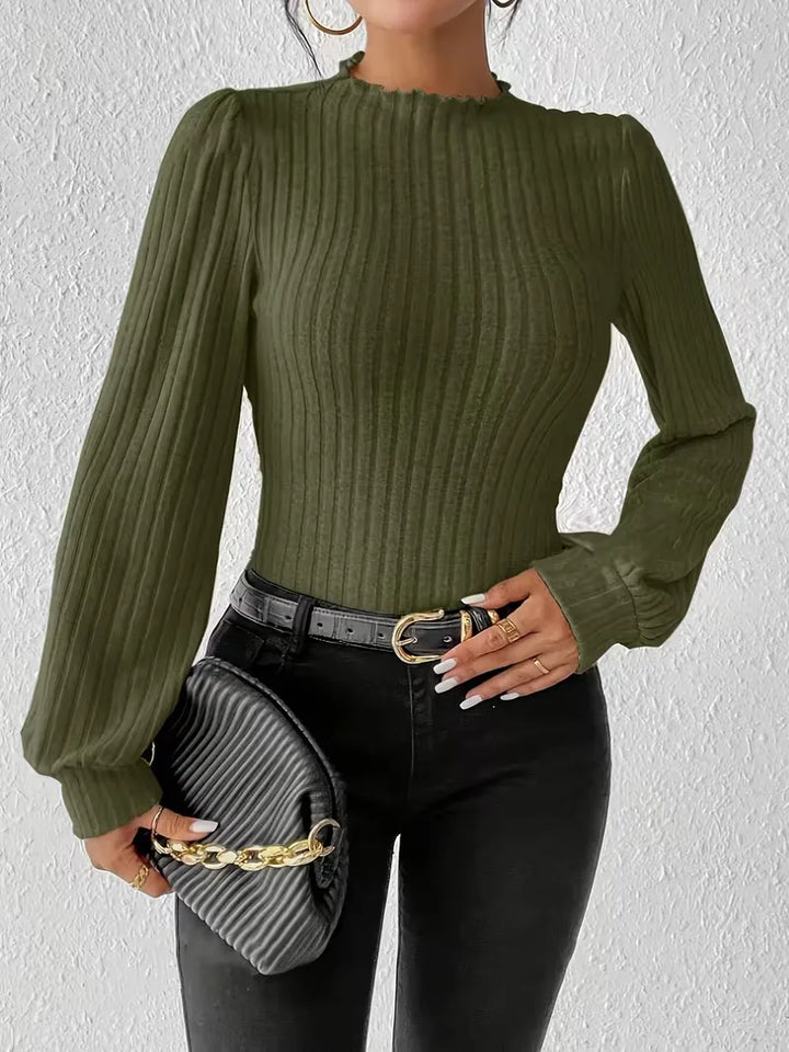 Slim fit bodysuit voor dames, met comfortabele lange mouwen en trendy mock hals.