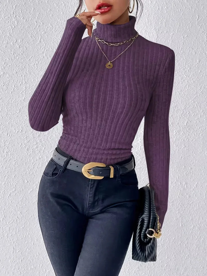 Modieuze herfst/winter dameskleding: slim fit coltrui. Houdt u warm en stijlvol tegelijk.