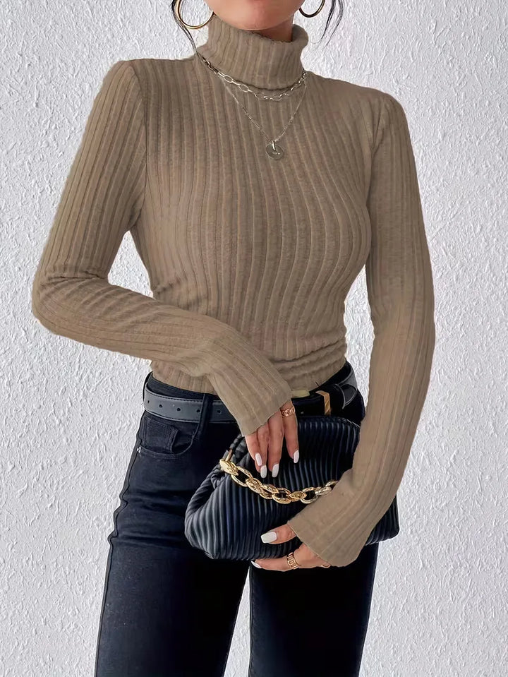 Essentiële dames coltrui, slim fit, lange mouwen, veelzijdig en stijlvol. Een garderobe klassieker.