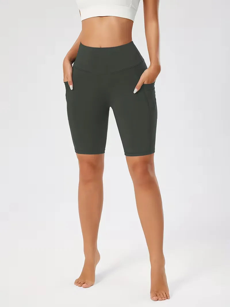 Dames fitness shorts, slim fit high waist met zakken, comfortabel en stijlvol.