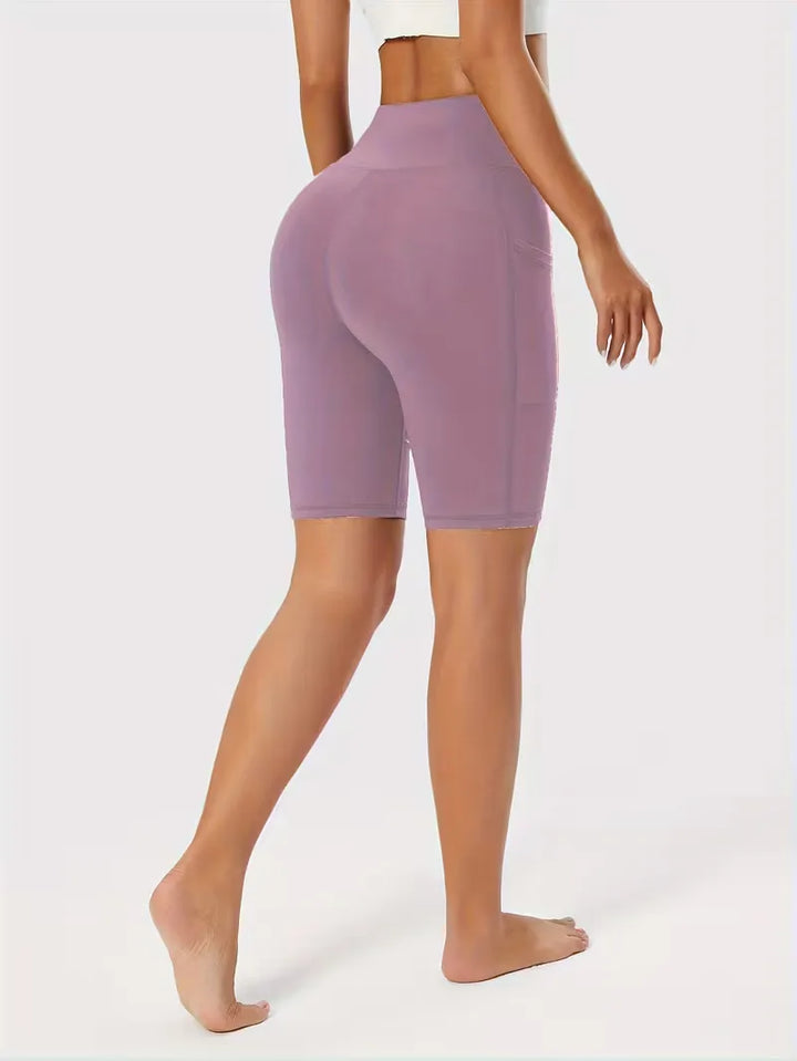 Dames fitness shorts, high waist, slim fit, met zijzakken, voor trainingen.