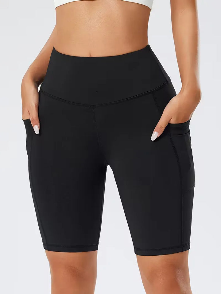 Moderne dames slim-fit high waist shorts met zakken, perfect voor fitness.