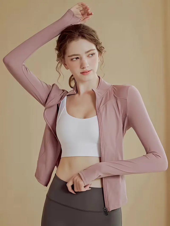 Achteraanzicht dames slim fit trackjacket, strakke pasvorm, ideaal voor actieve dames.