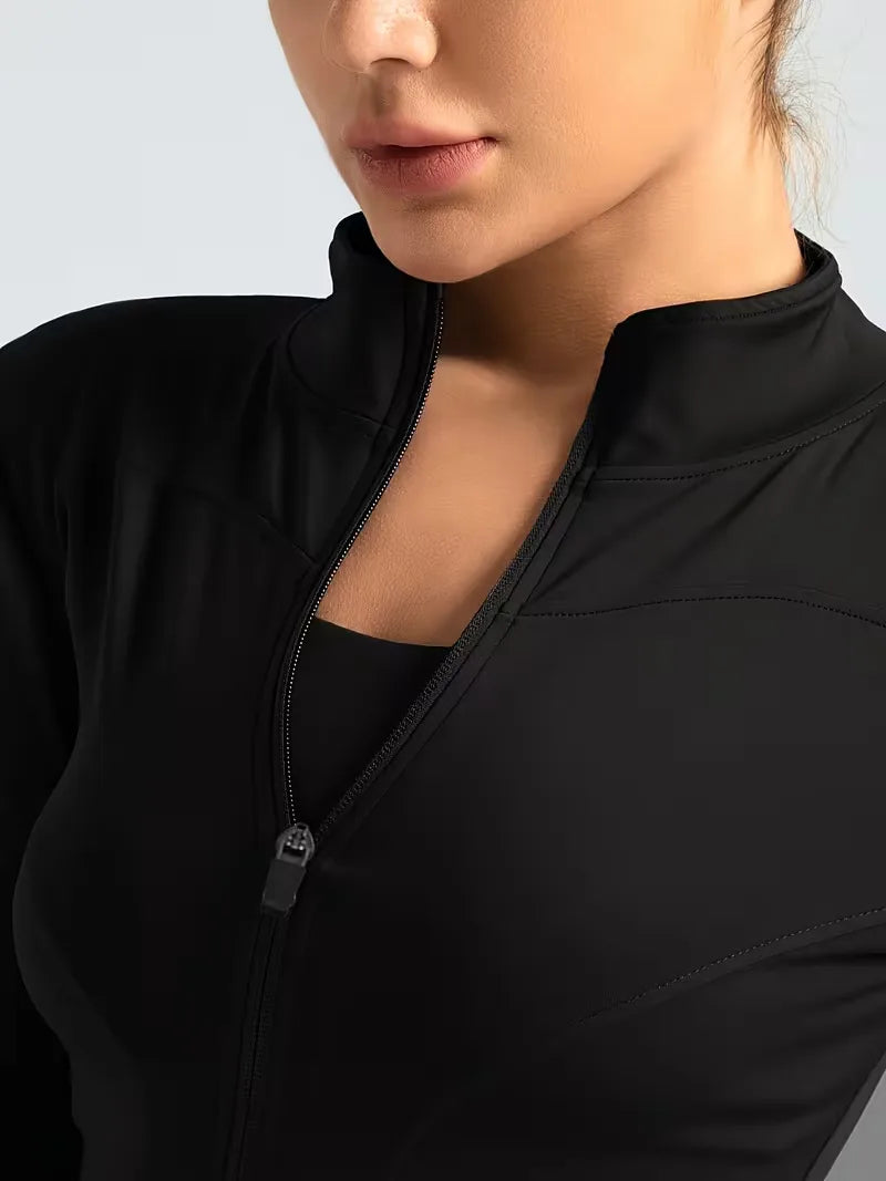 Ademende dames sportjack slim fit met duimgaten, ideaal voor intensieve fitness sessies.
