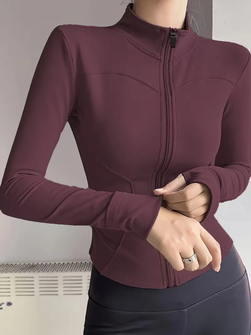 Dames fitness track jacket slim fit, met duimgaten, ondersteunt elke workout routine.
