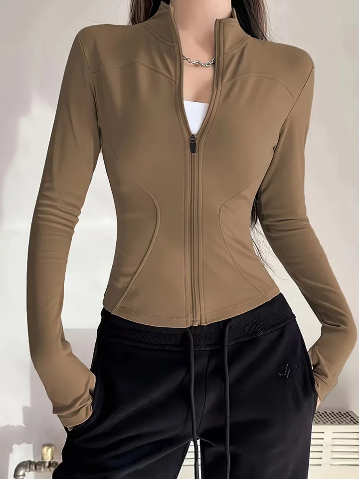 Flexibele dames slim fit trackjacket met duimgaten, voor yoga en pilates, ultiem comfort.