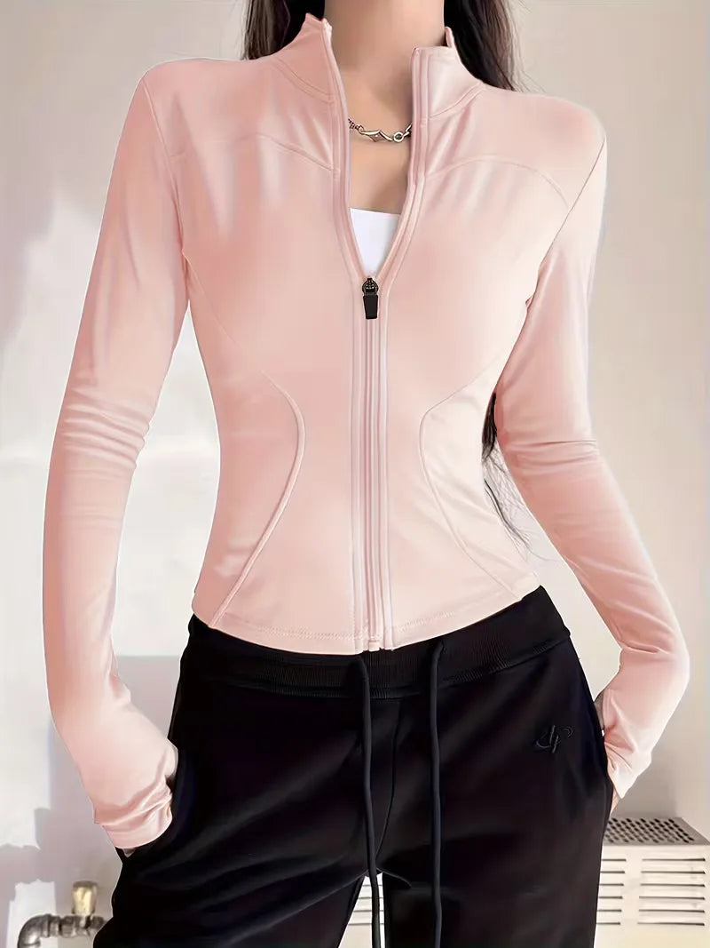 Stijlvolle dames sportkleding trackjacket slim fit, met duimgaten, voor een complete outfit.