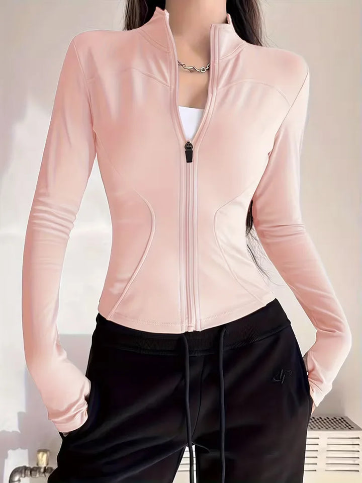 Stijlvolle dames sportkleding trackjacket slim fit, met duimgaten, voor een complete outfit.