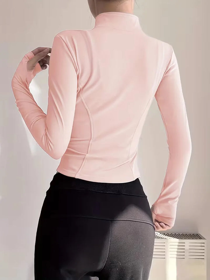 Zachte stof dames slim fit trackjacket met duimgaten, comfortabel voor de hele dag.