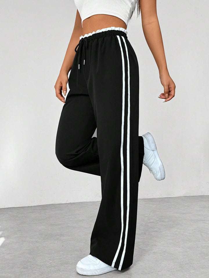 Comfortabele wide-leg broek voor dames met trendy strepen; perfect voor streetwear en dagelijks gebruik.