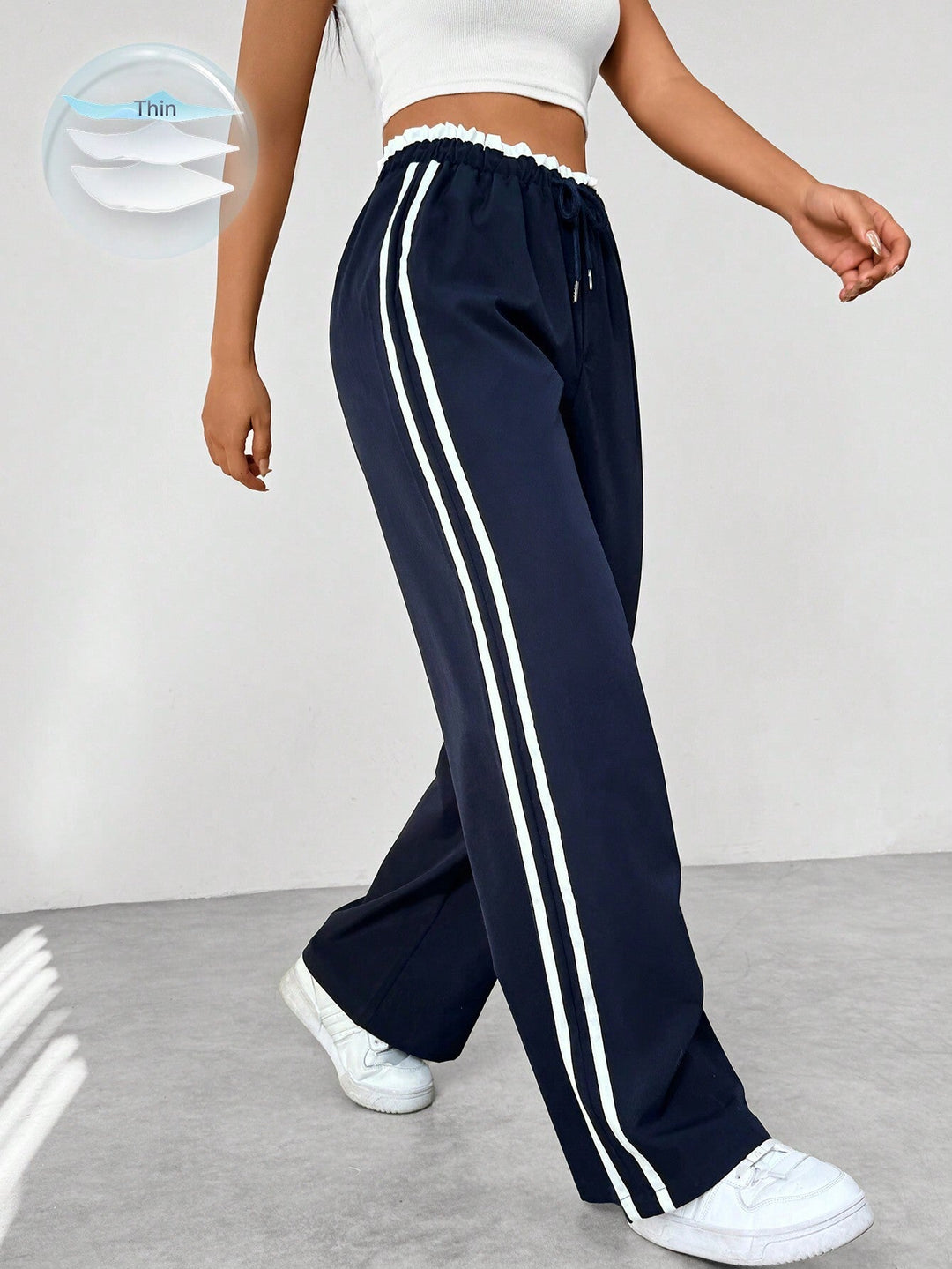 Streetwear wide-leg broek voor dames met trendy sportieve strepen, comfortabel en zeer stijlvol.