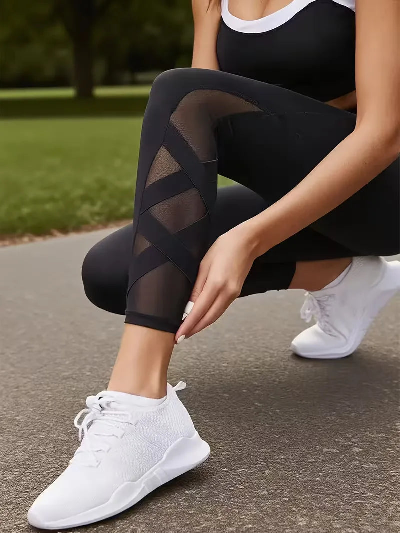 Functionele dames sportlegging met handig zijvak en mesh ventilatie. Perfect voor workout, yoga of hardlopen.