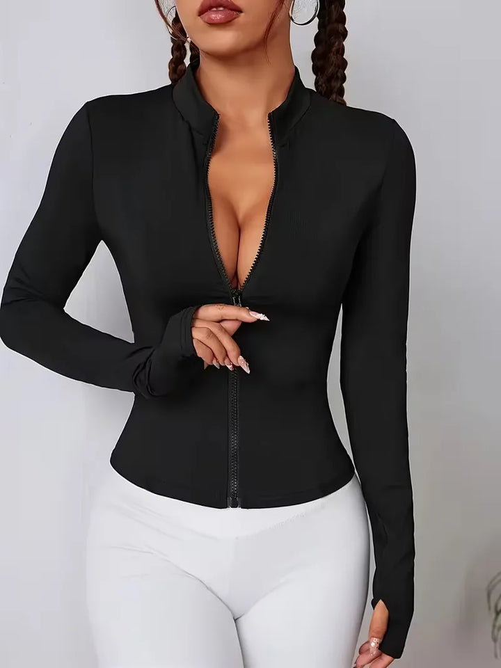 Dames sporttop met lange mouwen, slim fit, ideaal voor training en fitness.