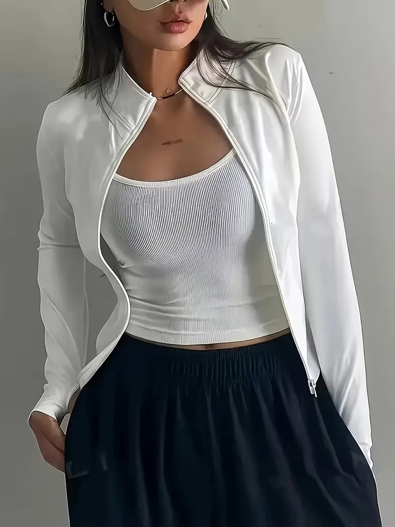 Ademende dames sporttop met lange mouwen, slim fit, essentieel voor elke training.