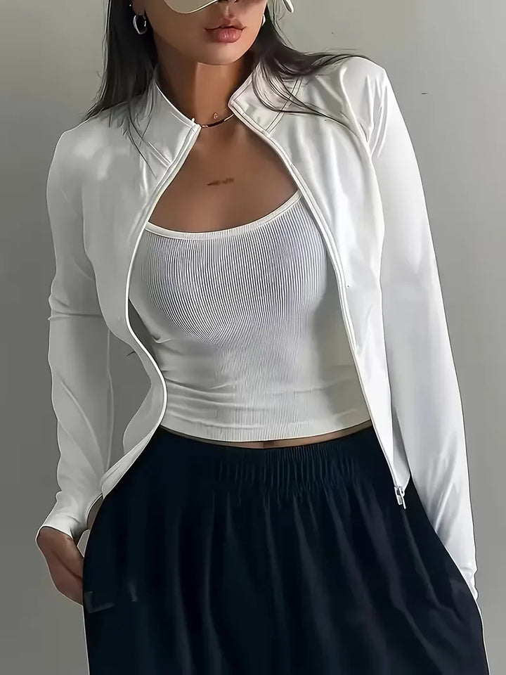 Ademende dames sporttop met lange mouwen, slim fit, essentieel voor elke training.