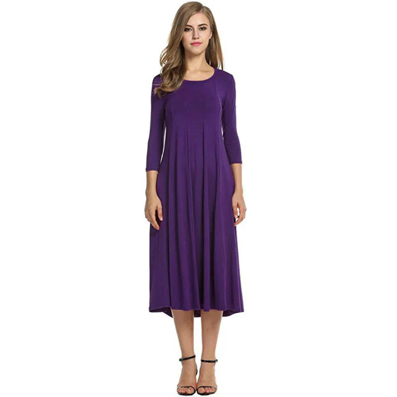 Zomerjurk voor dames, midi lengte, driekwart mouwen. Stijlvol, elegant en comfortabel.