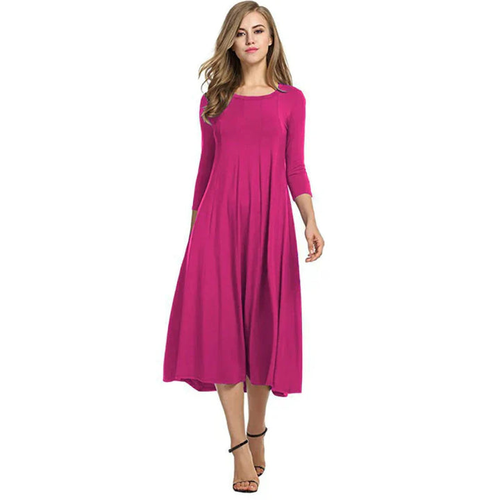 Trendy driekwart mouw midi zomerjurk voor vrouwen, elegant en geschikt voor elke dag.