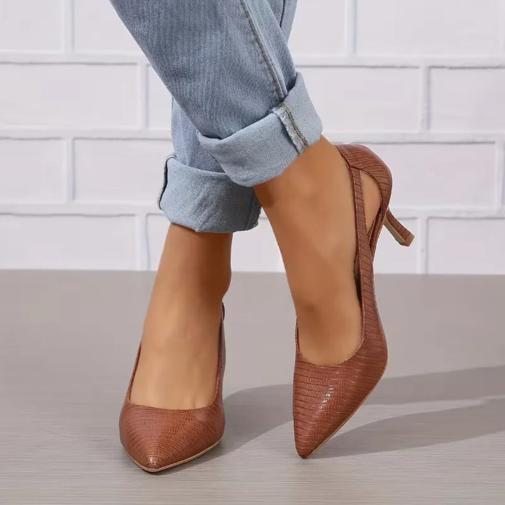 Chique dames stiletto's met cut-outs en puntige neus, ideaal voor feesten en formele gelegenheden.