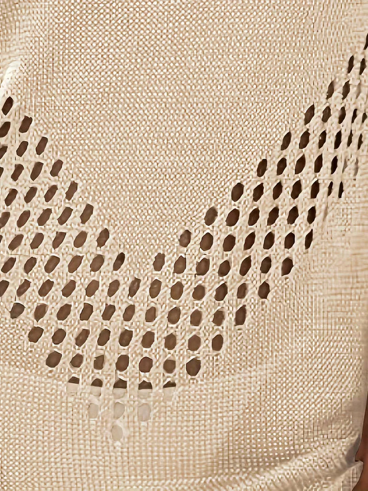 Mouwloze strandjurk dames met cut-out details, ideaal voor ontspanning aan het water.