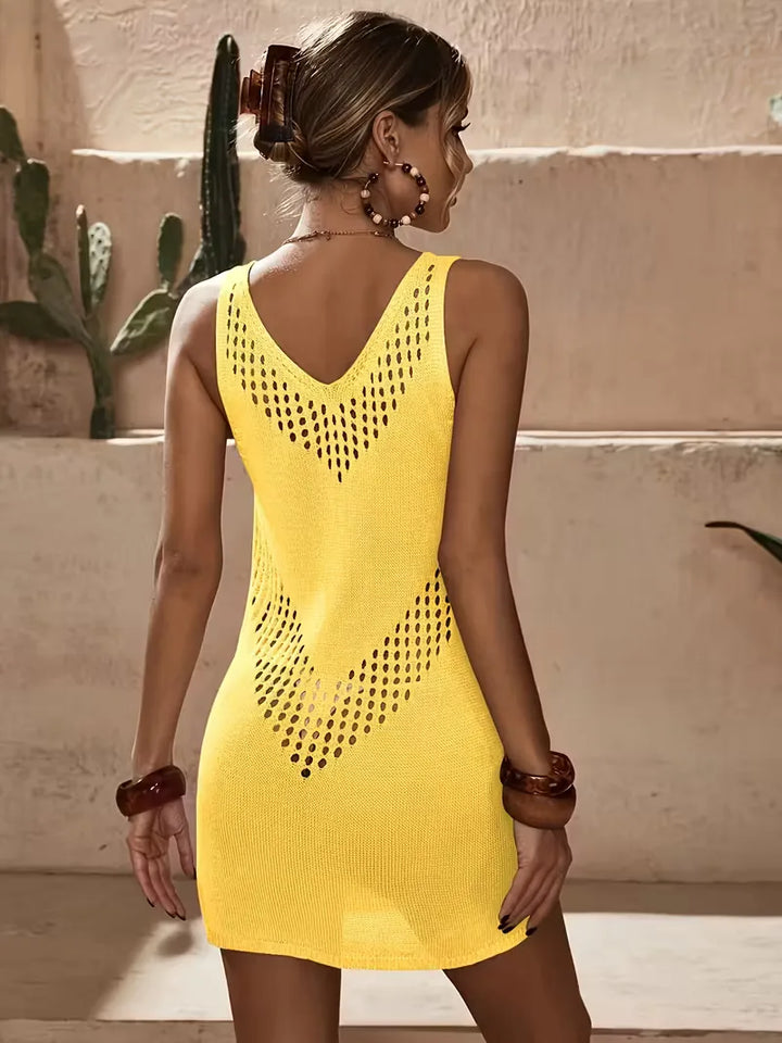 Mouwloze dames strandjurk, casual, met decoratieve cut-outs en een V-hals.