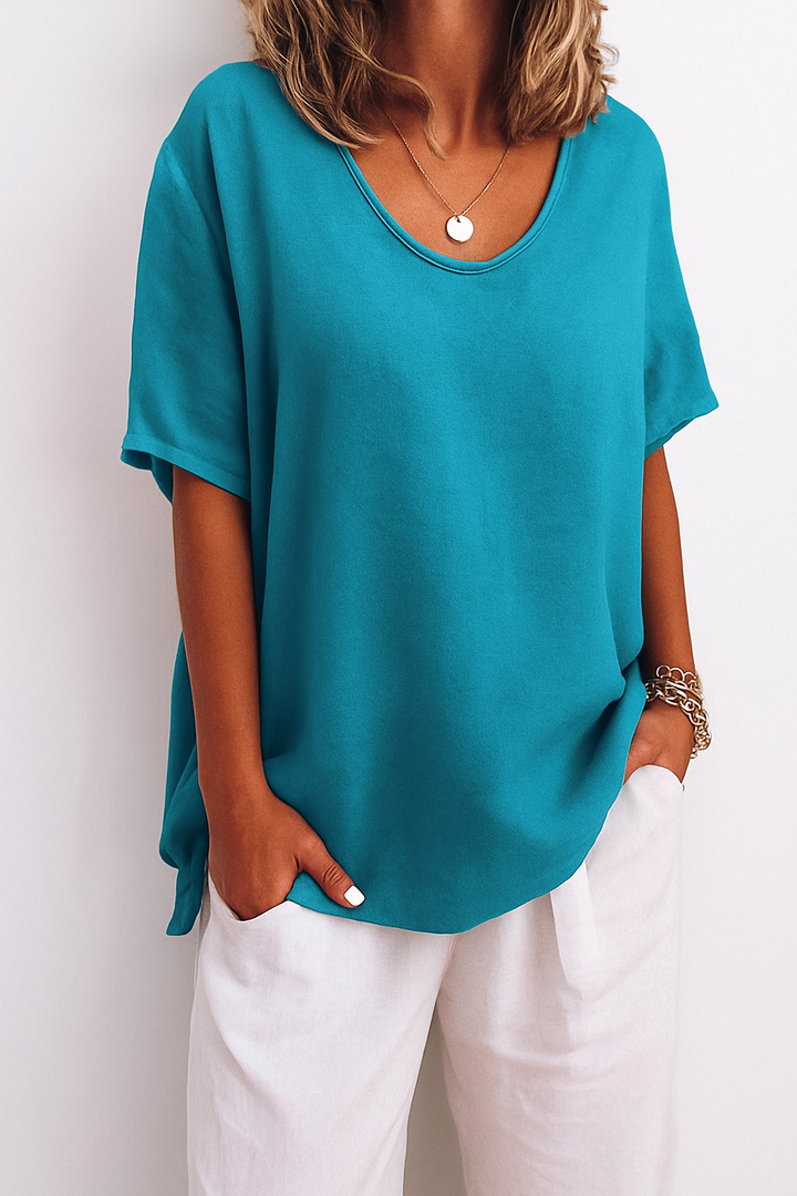 Stijlvol dames t-shirt met korte mouwen en relaxed fit, perfect voor dagelijks comfort. Zomerse vrouwenkleding.