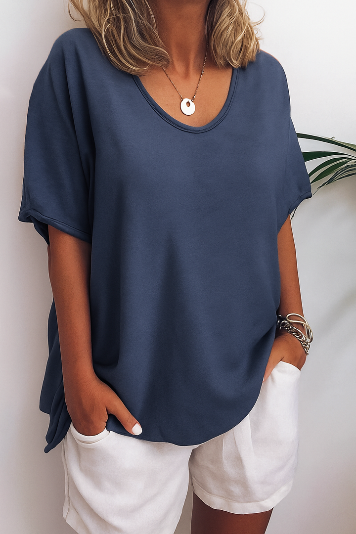 Veelzijdig dames t-shirt, ronde hals, korte mouwen. Basiskleding voor zomer, ademend comfort en tijdloze elegantie.