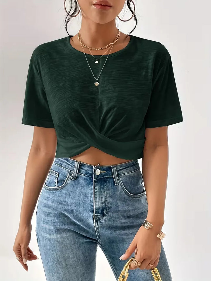 Dames T-shirt met modieus twistdetail aan de zoom, rondehals, korte mouwen, comfy.