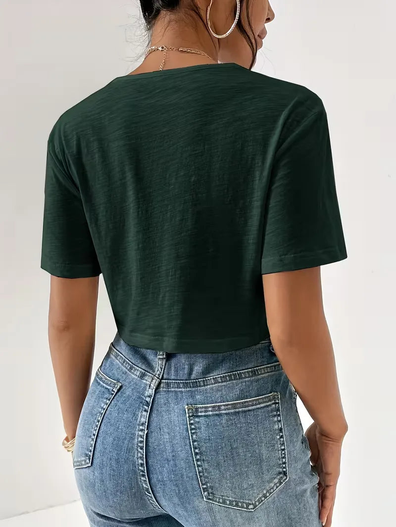 Wit dames T-shirt met opvallend twistdetail, voor een frisse en moderne uitstraling.