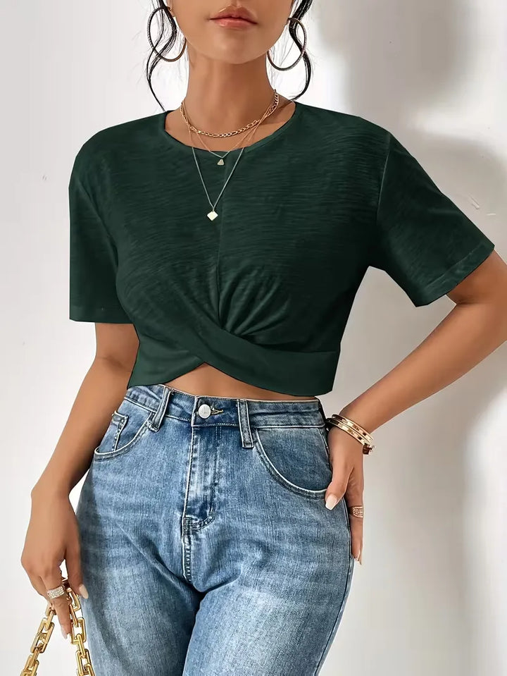 Zwart dames T-shirt met subtiel twistdetail, ideaal voor een chique casual look.