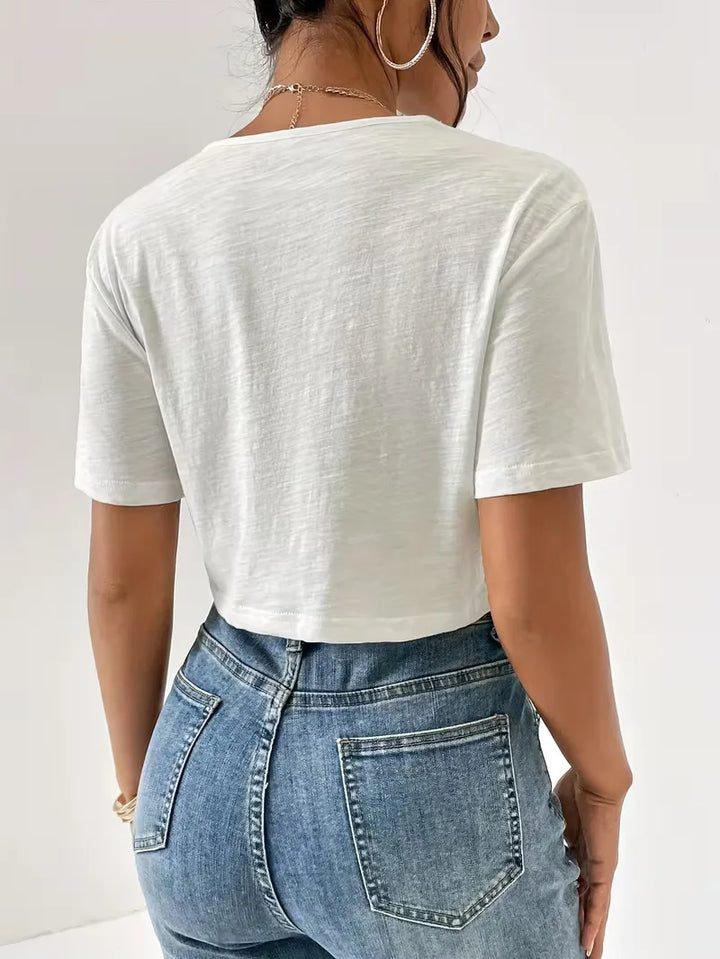 Trendy dames T-shirt met opvallend twistdetail, regular fit, perfect voor lente/zomer.