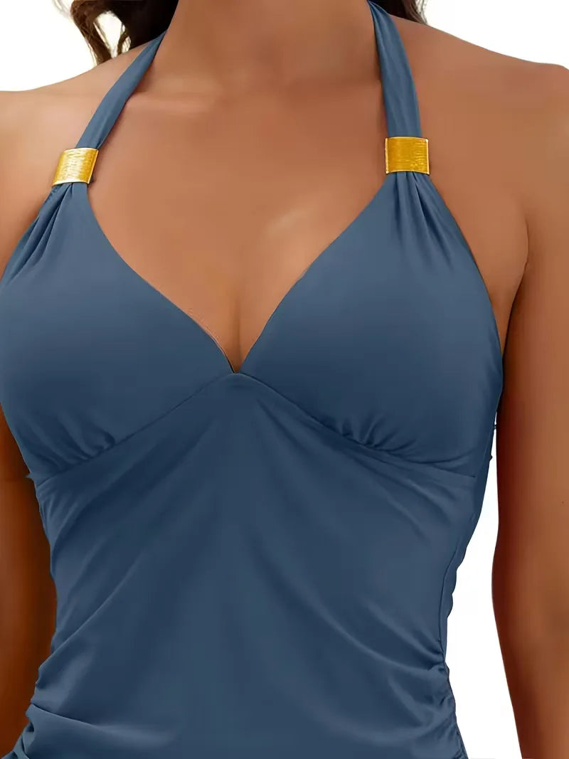Elegante dames tankini zwempak met V-hals en halternek. Hoog getailleerd voor een mooie pasvorm.