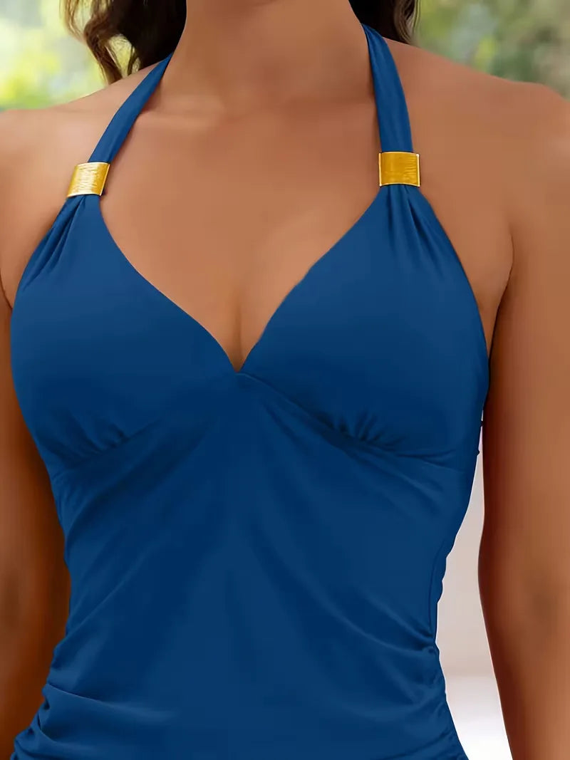Zomerse dames tankini met V-hals en halternek. Hoog getailleerd zwempak, perfect voor ontspanning.
