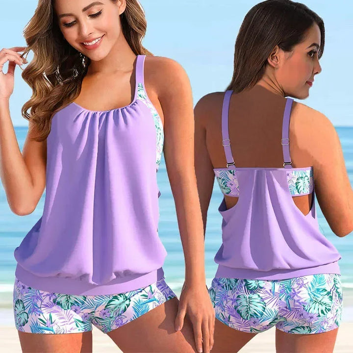Gedetailleerde weergave van de stof en het patroon van de dames tankini, onderdeel van een zwemset.