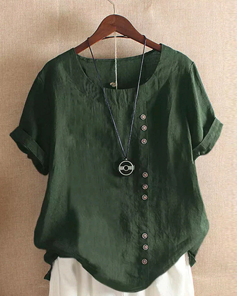 Dames T-shirt met knoopdetails, korte mouwen. Verkrijgbaar in diverse kleuren en plus size maten.