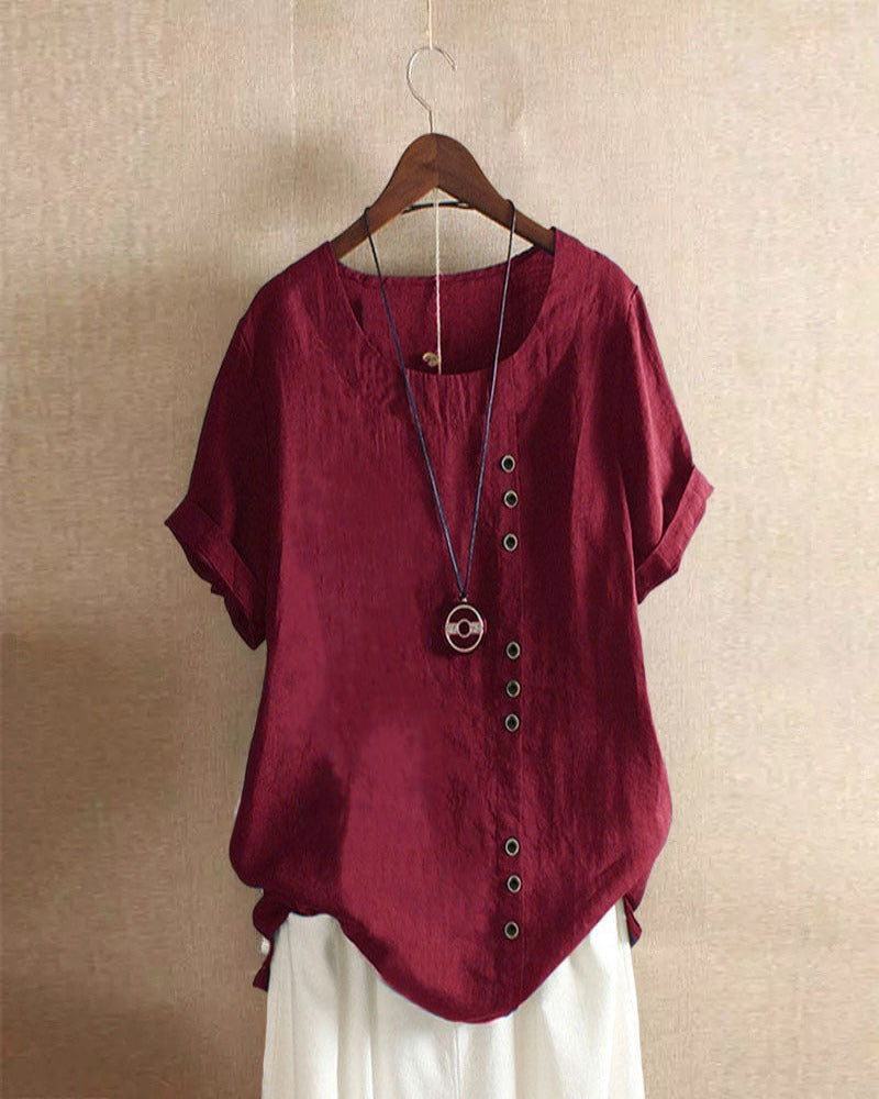 Elegante comfortabele dames top met korte mouwen en knoopjes. Perfect voor lente/zomer garderobe.