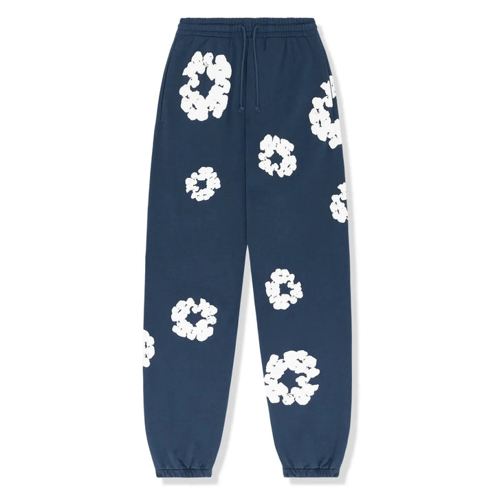 Voorzicht van de complete dames trainingsset, bestaande uit een broek en top met bloemen.