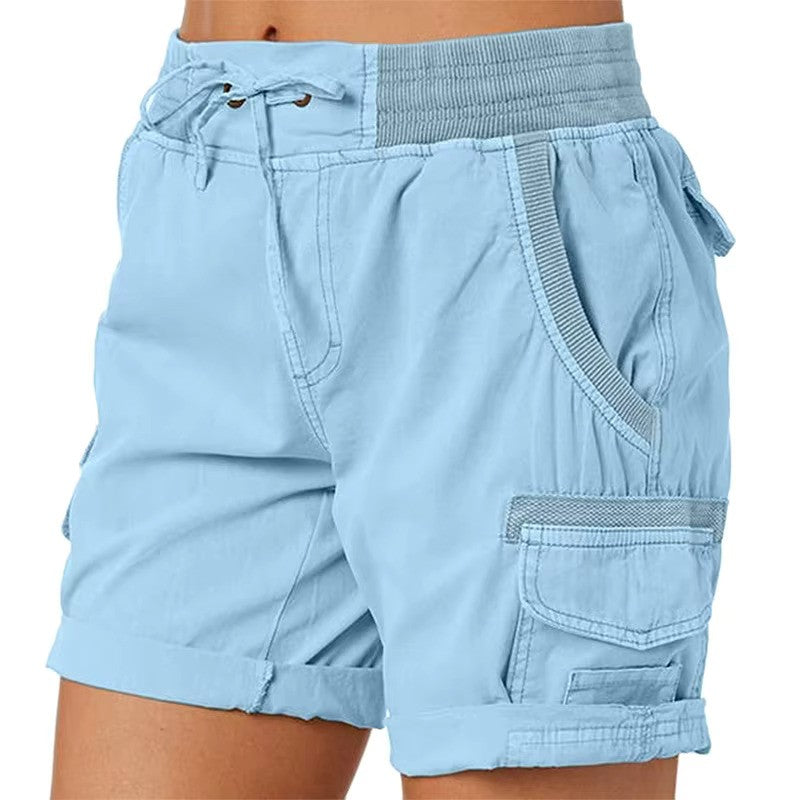 Close-up van de trendy Hoymans dames strandshorts, lage taille en slim fit detail