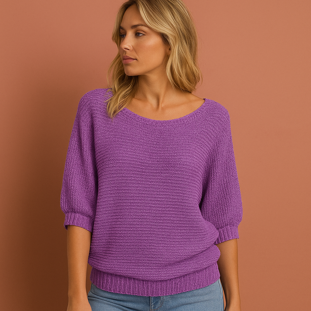 Zachte gebreide damestrui met verfijnde ruches, ideaal voor een stijlvolle en comfortabele casual look.