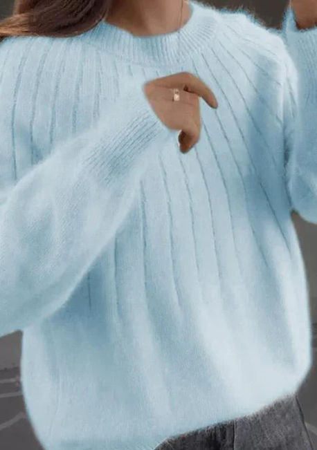 Dames trui: heerlijk zacht en fluffy met een comfortabele ronde hals. Ideaal voor elke dag.