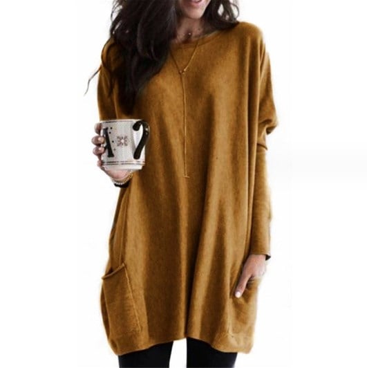 Dames trui met lange mouwen, losse pasvorm, ribboorden. Essentieel voor casual en elegante outfits.