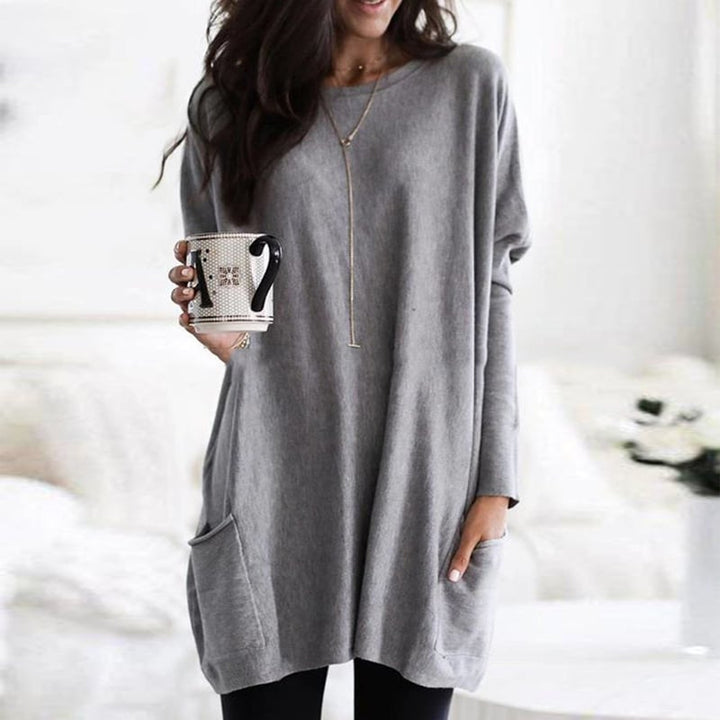 Stijlvolle dames trui met losse pasvorm, lange mouwen en subtiele ribdetails. Trendy mode.