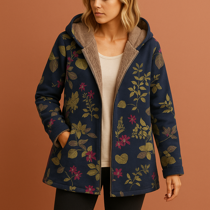 Dames tussenjas met levendige bloemenprint, perfect voor lente en herfst.