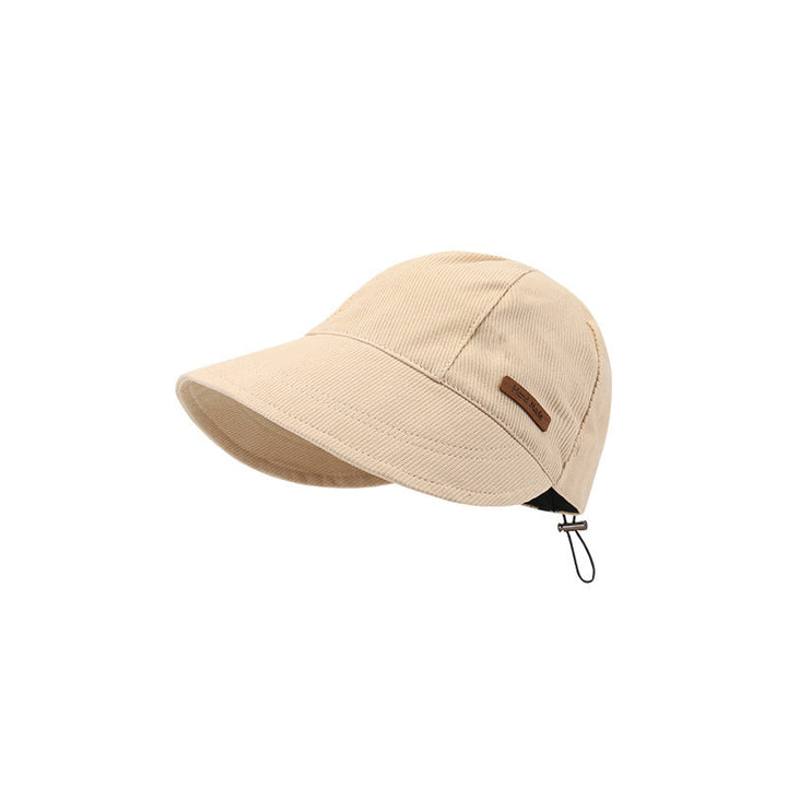 Beige ademende dames strandhoed met UV-bescherming en brede rand. Sneldrogend, ideaal voor zomer.