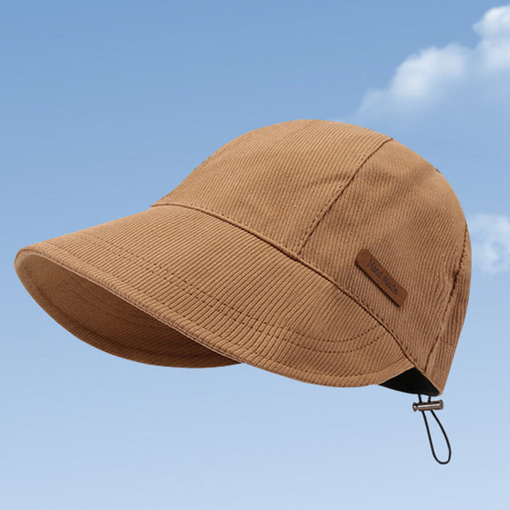 Opvouwbare dames UV-zonnehoed met brede rand, perfect als strandhoed. Essentiële zomeraccessoire.