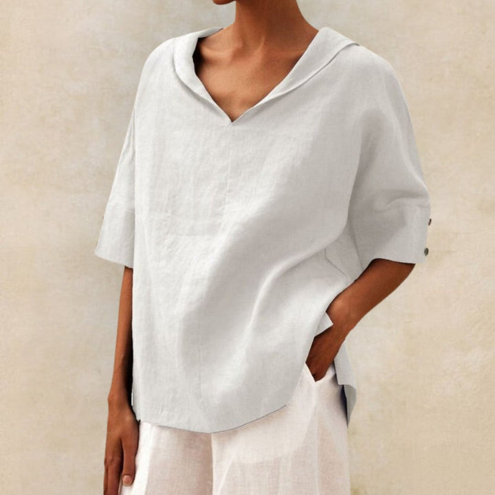 Elegant dames V-hals overhemd met relaxte pasvorm. Perfect als casual mode basisstuk voor lente en zomer. Comfortabel.