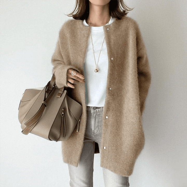 Dames vest, elegant & comfortabel. Dit modieuze vestje is perfect voor casual en formele gelegenheden, seizoensloze stijl.